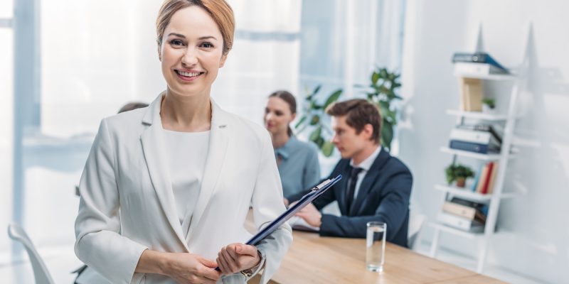 selective-focus-of-cheerful-recruiter-standing-with-clipboard-near-coworkers.jpg selective-focus-of-cheerful-recruiter-standing-with-clipboard-near-coworkers.jpg